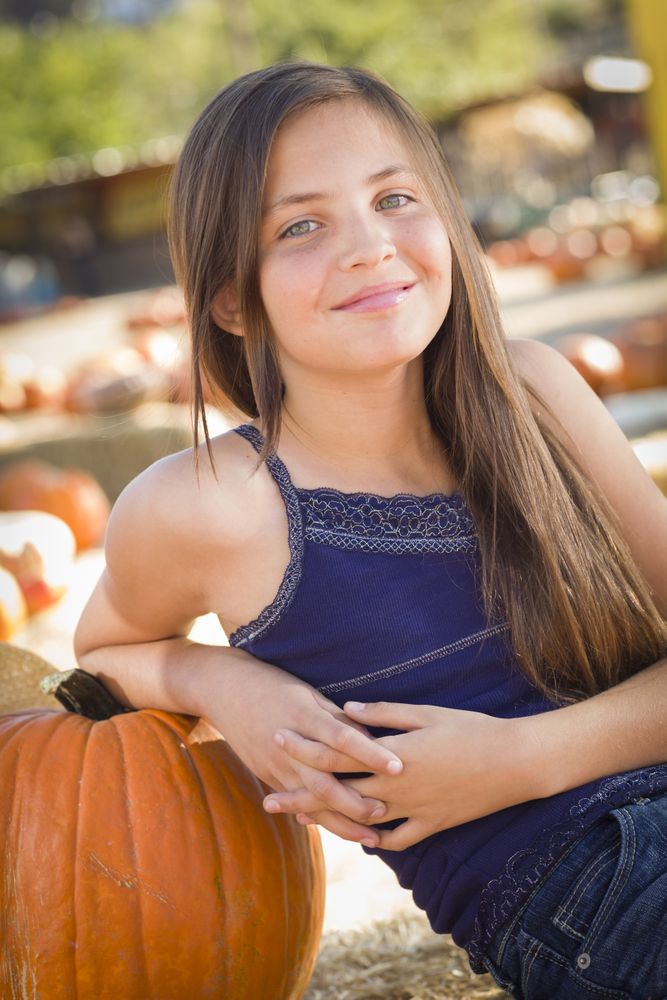 Girl Portrait at the Pumpkin Patch