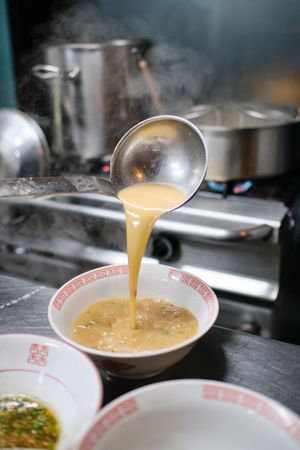 Process of making soup in kitchen