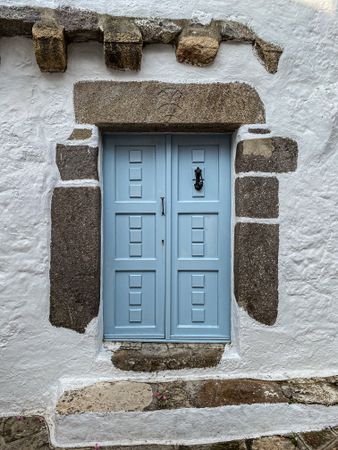 Patmian blue door with knocker