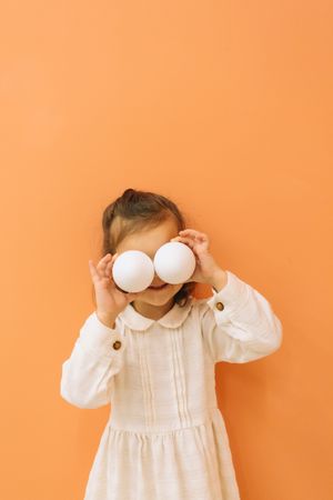 Cute little girl with Easter eggs