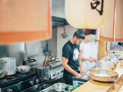 Kitchen staff in Asian cafe