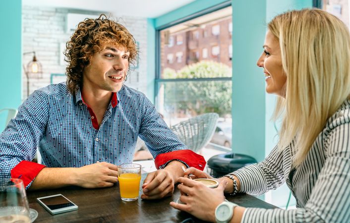 Couple eating breakfast at a cafe