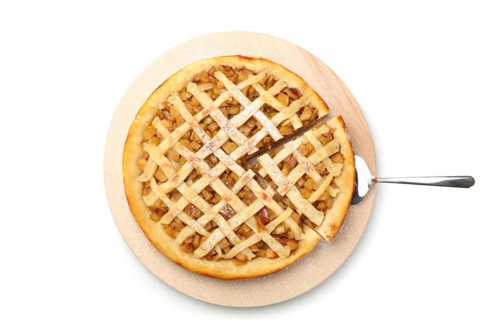 Tray with apple pie isolated on blank background. Homemade food