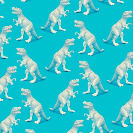 Painted dinosaur pattern on blue background