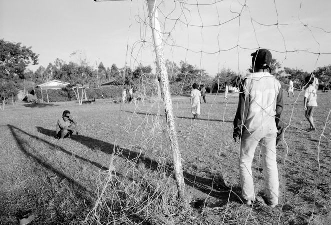 Itapeva, Brazil - August 2006 - Monochrome image of children playing soccer