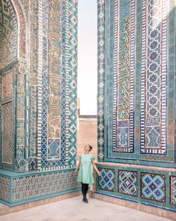 Unrecognizable tourist inside ancient building