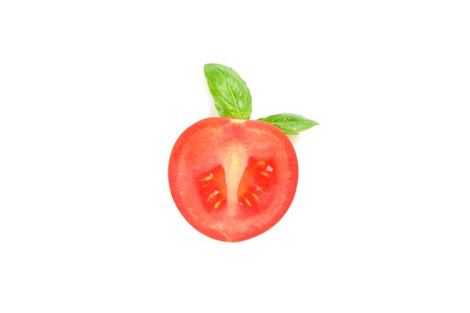 Fresh cherry tomato with basil isolated on blank background. Ripe vegetables