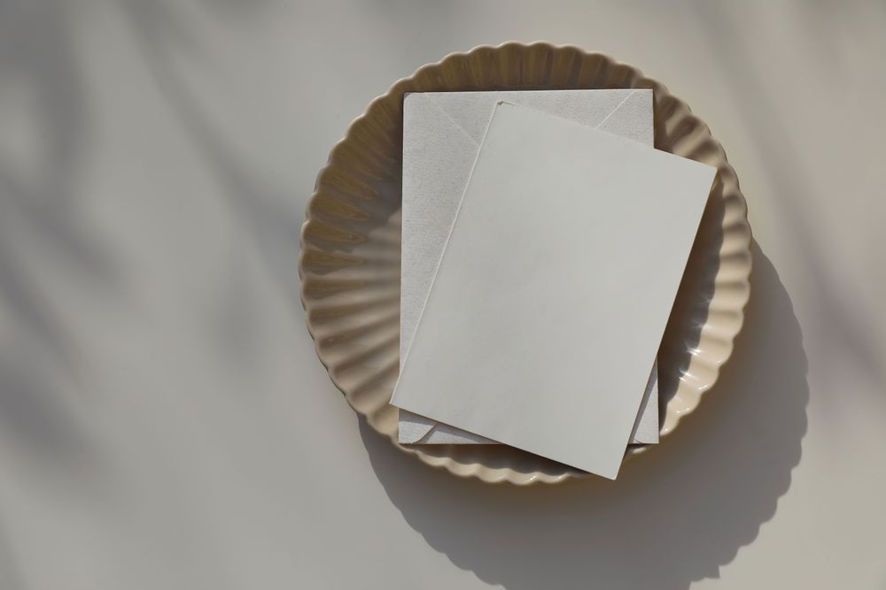 Blank greeting card, invitation mockup, envelope in sunlight