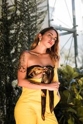 Young stylish woman in garden