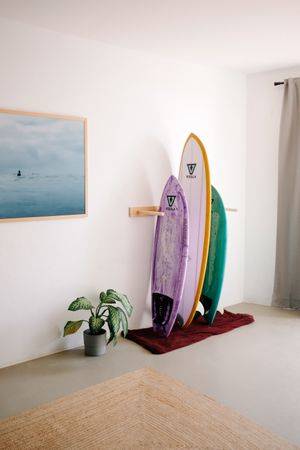 Surfboards propped up in rack
