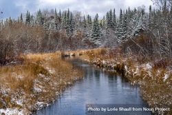 A stream and snow covered evergreens in Itasca County, Minnesota 4Bav2k