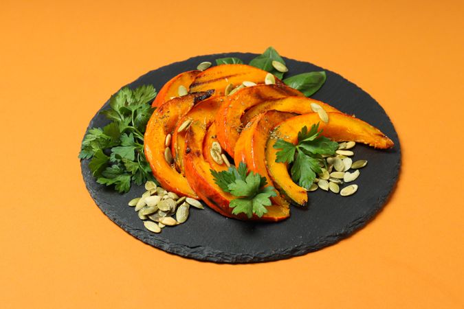 Concept of tasty homemade dish - baked pumpkin