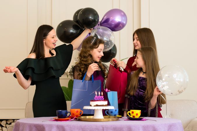 Family celebrates girl's birthday