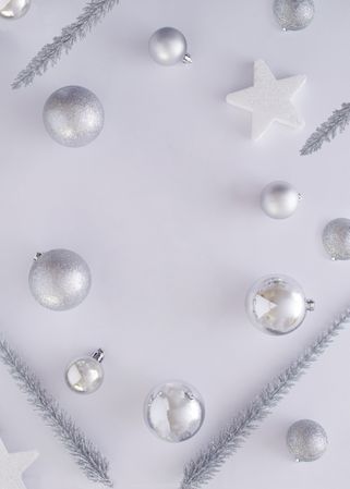 Top view of silvery Christmas decorations, copy space