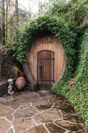 Wooden barrel-shaped entrance to Napa Valley wine cellar