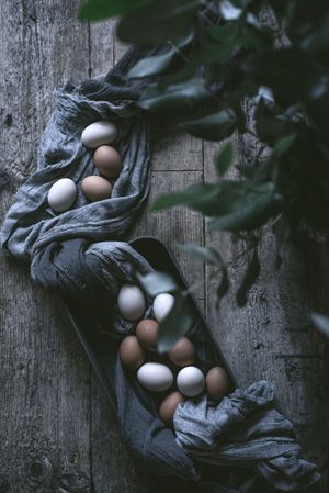 Raw eggs on tablecloth