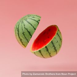 Watermelon slices on pastel pink background with copy space 0KVEAb