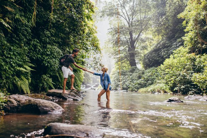 Man and woman enjoying hiking in nature