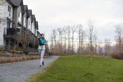 Young female running in the morning hours