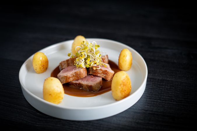 Duroc sirloin with orange ginger soy and potatoes