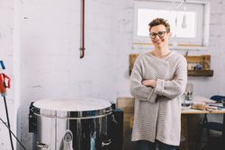 Confident potter in workshop