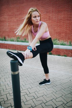 Woman stretching after running