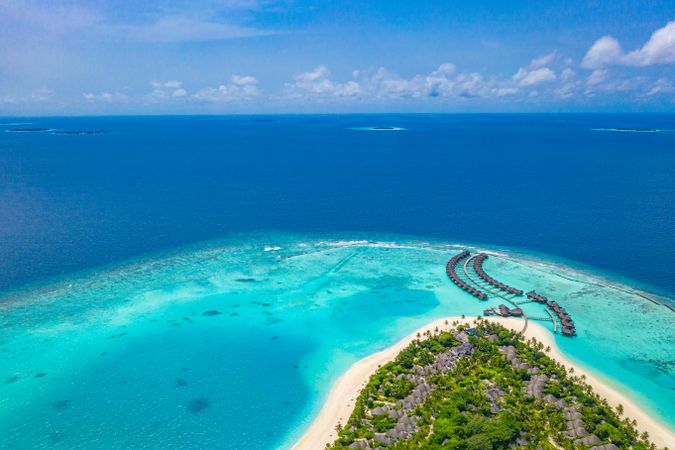 Landscape aerial shot of beach resort with blue tropical waters