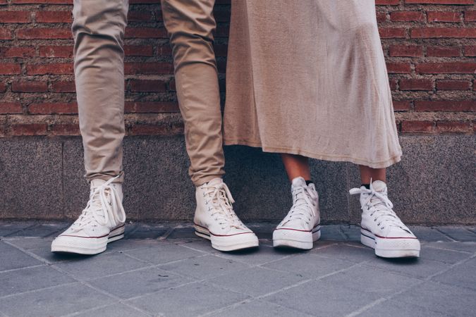 Crop view of couple feet in street