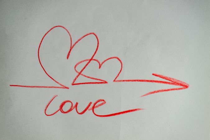 Valentine Day holiday card concept with love, hearts and arrow scribbled on paper