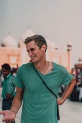 Smiling man in t-shirt on street