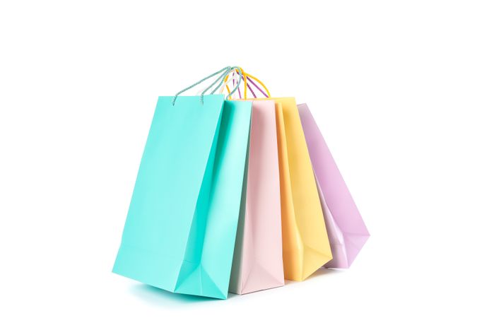 Multicolor paper bags isolated on blank background