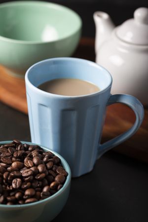 Cup of coffee with creamy milk.