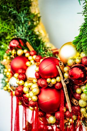 Christmas frame with thuja and red and golden baubles