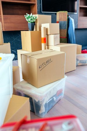 Living room with stack of moving boxes