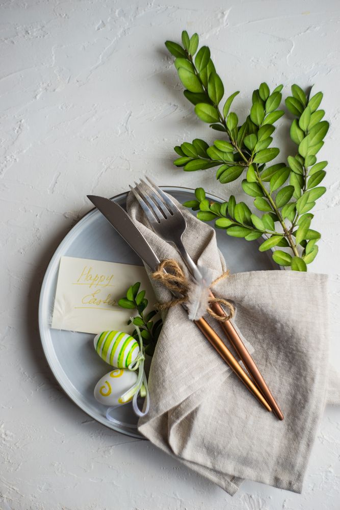 Easter table setting with branch and egg decor
