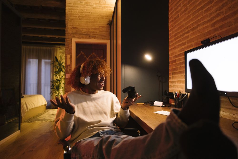 Young man playing video games