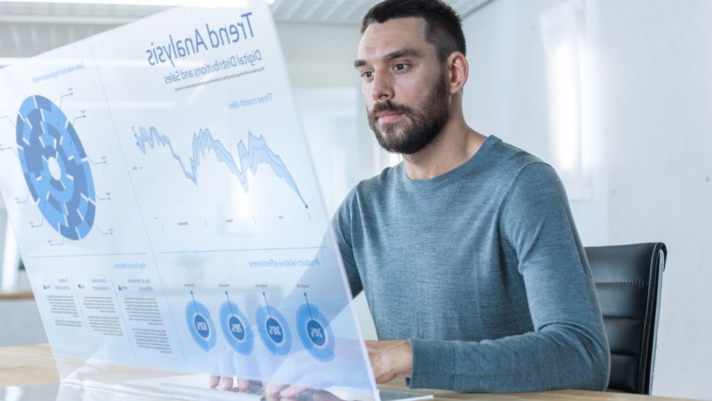 In the Near Future Successful Trader Works on Computer with Transparent Display