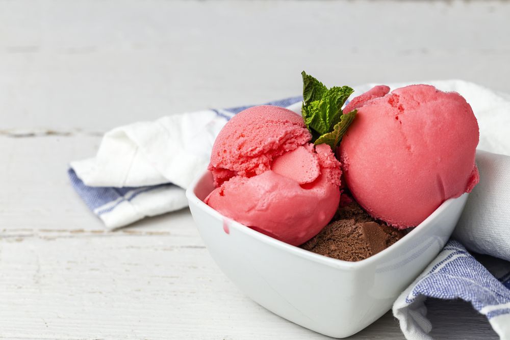 Appetizing strawberry ice cream in bowl