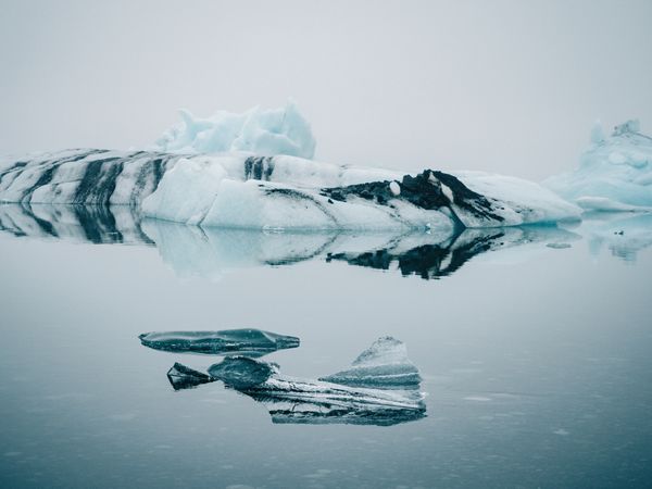 Ice on water between snow