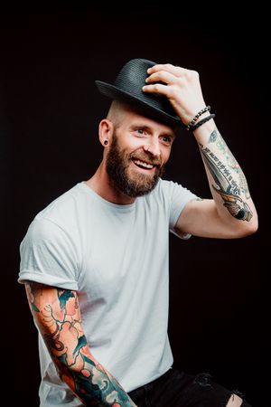 Smiling young guy in hat