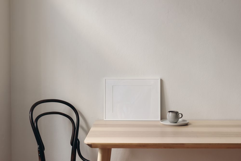 Picture frame mockups on wooden table