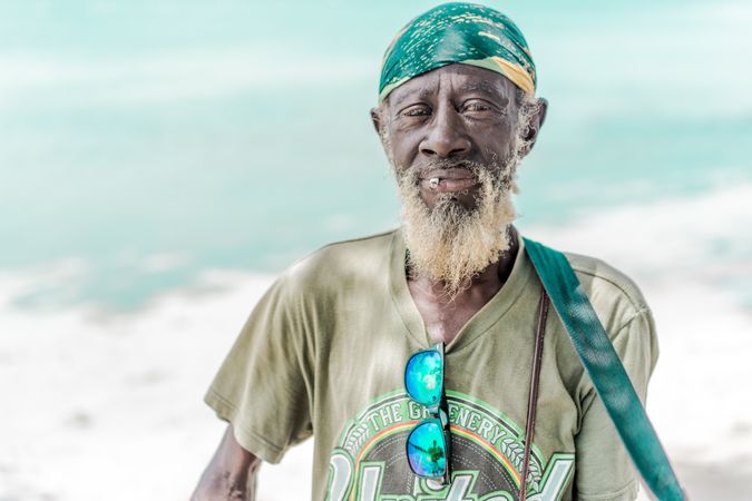 Jamaican man playing guitar