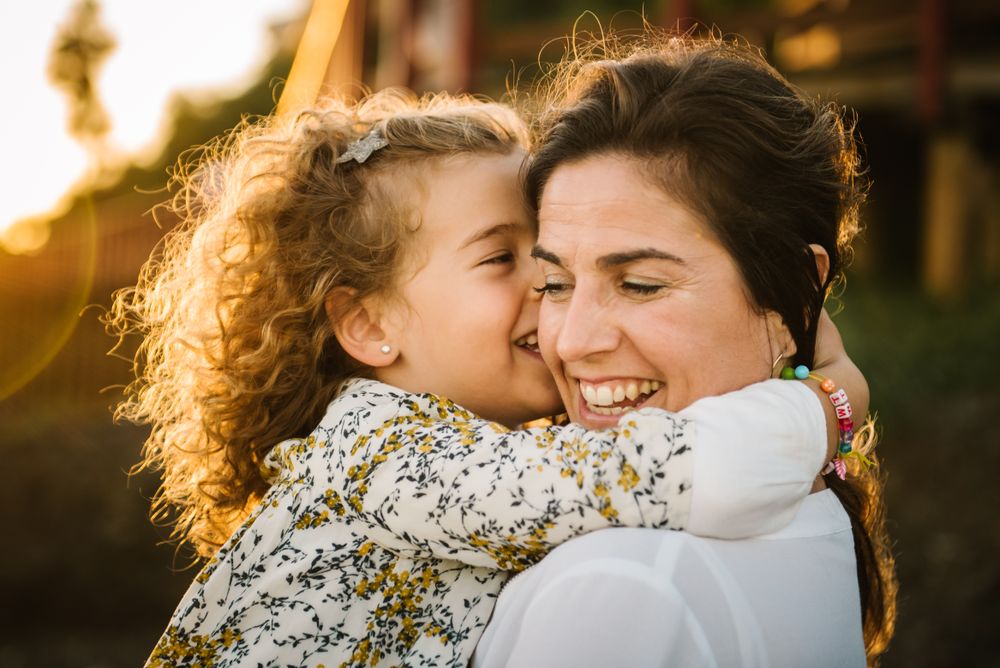 Mother with her daughter at beach