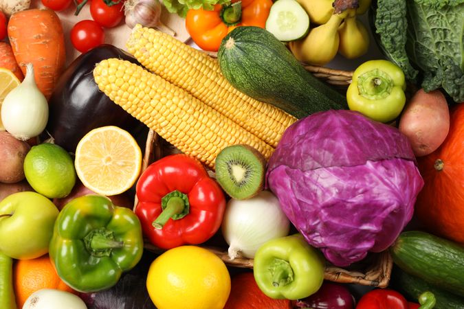 Vegetables and fruits texture on whole background, close up