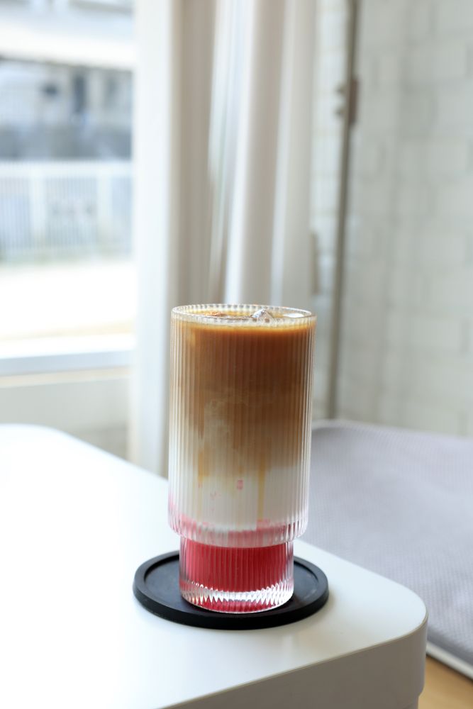 Glass of Iced Coffee Latte with Strawberry Jam