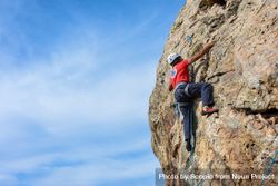 Man climbing rock mountain 42zdx4