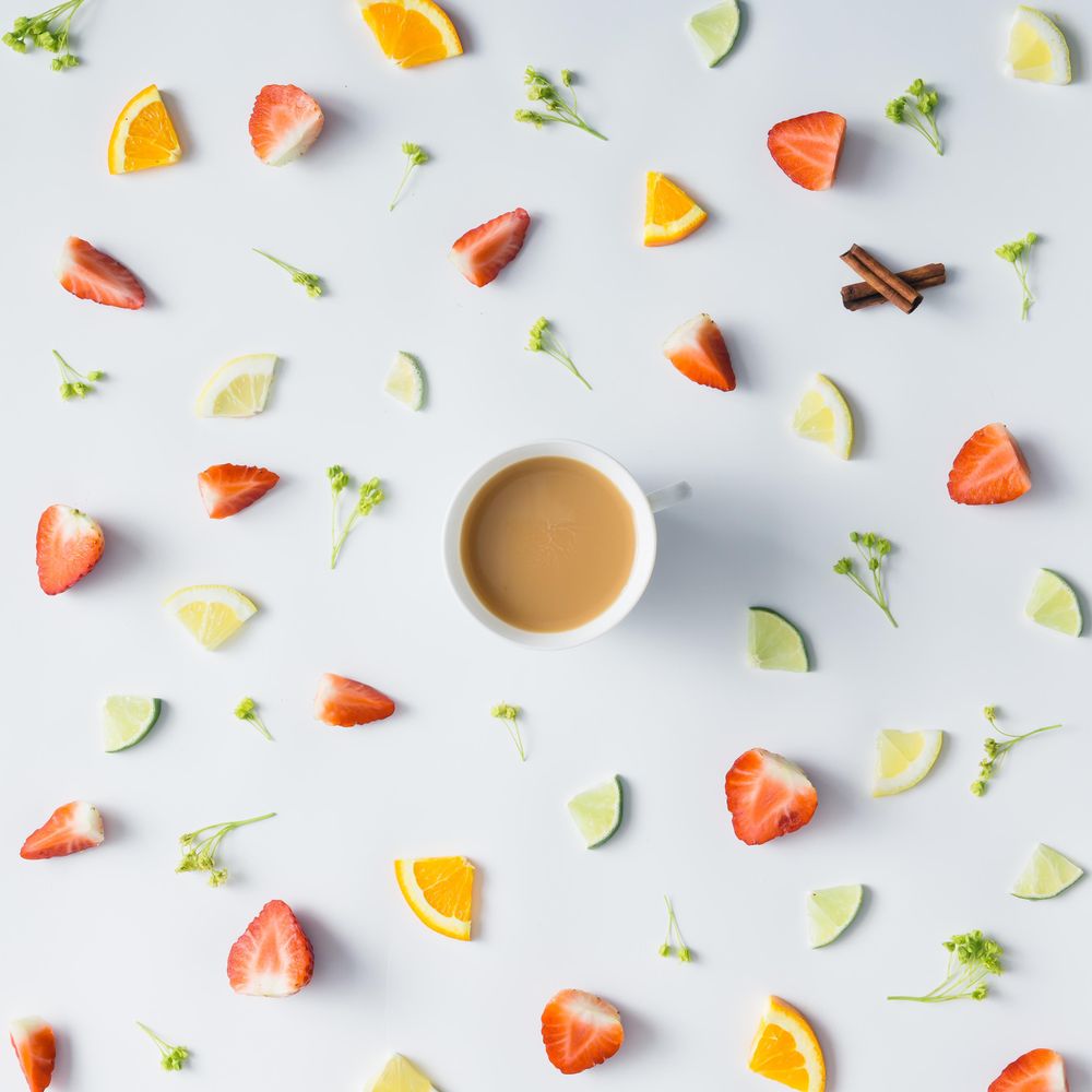 Pattern with strawberry, lime, oranges, leaves and coffee