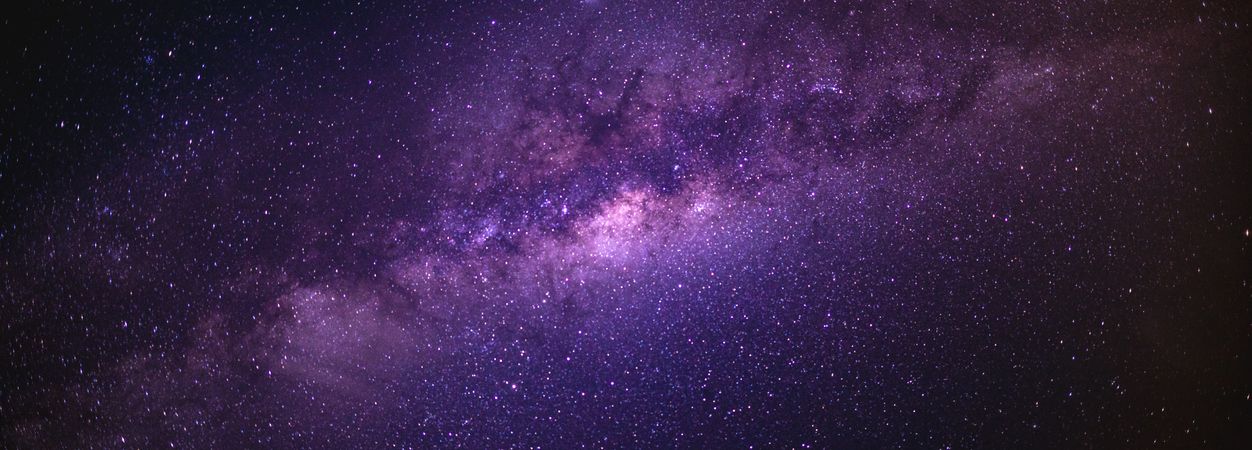 Wide shot of the Milky Way Galaxy with purple colors