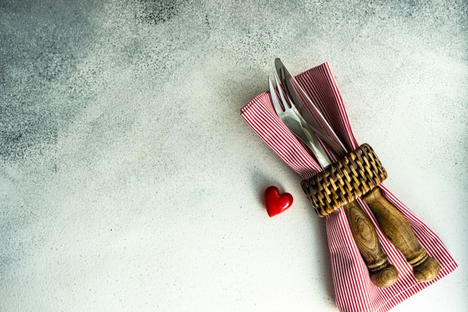  Cutlery in red napkin with heart decoration