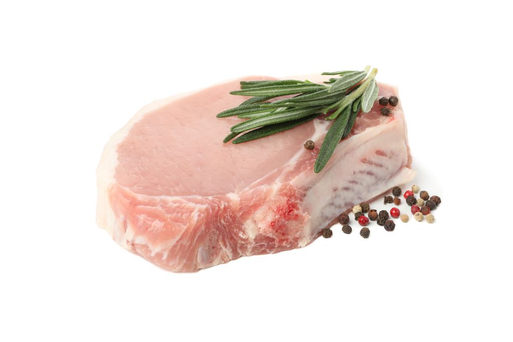 Raw meat for steak isolated on light background
